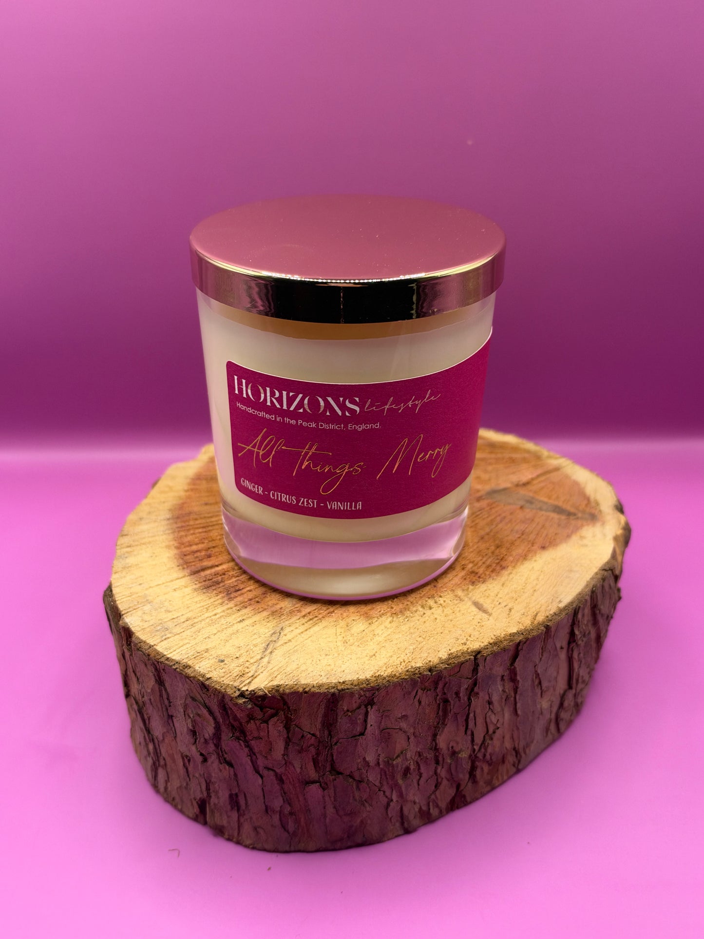 All things Merry glass candle